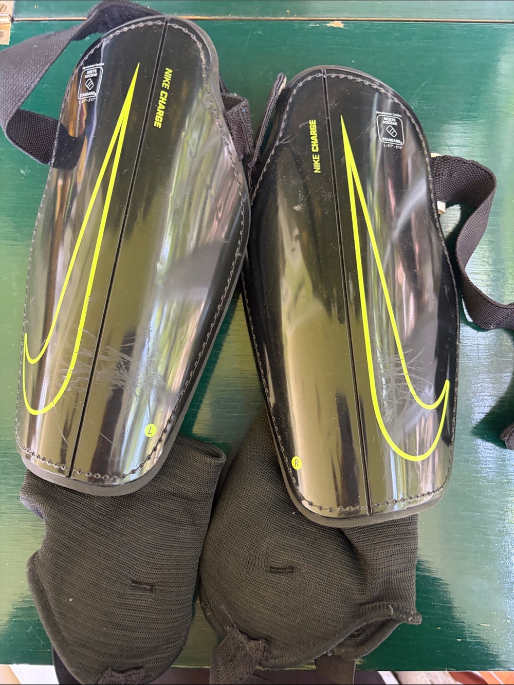 Nike Black Shin Guards with Neon Yellow Swoosh